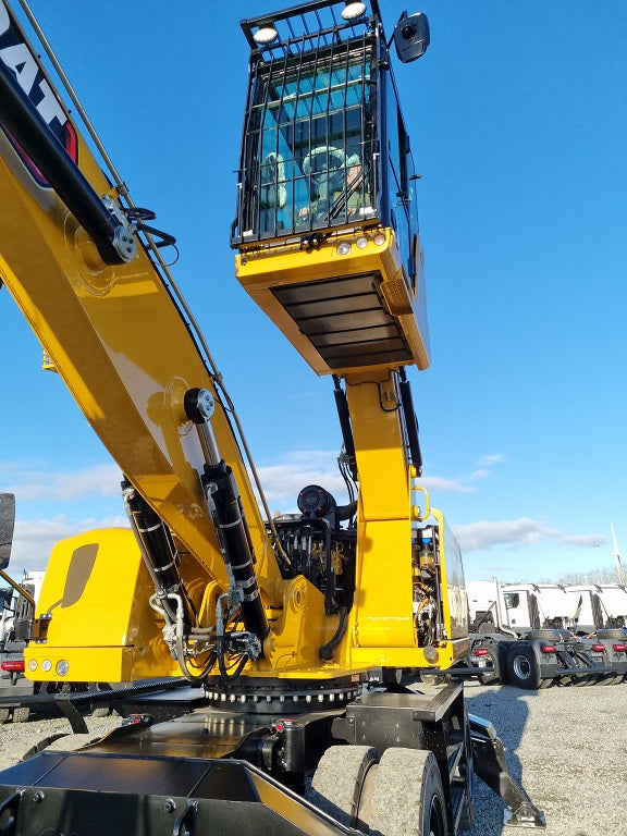 Caterpillar hydraulic elevating cab with FOPS Guard, ROPS guard.