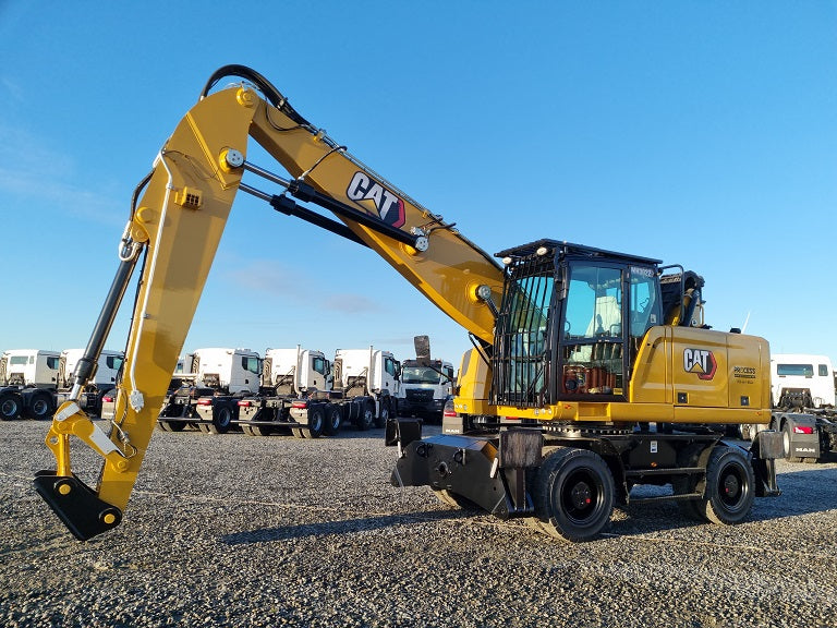 Caterpillar MH 3022 Material Handler on solid tires with 2-piece boom and stick with bucket linkage