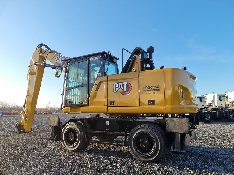 Caterpillar MH 3022 Material Handler on solid tires
