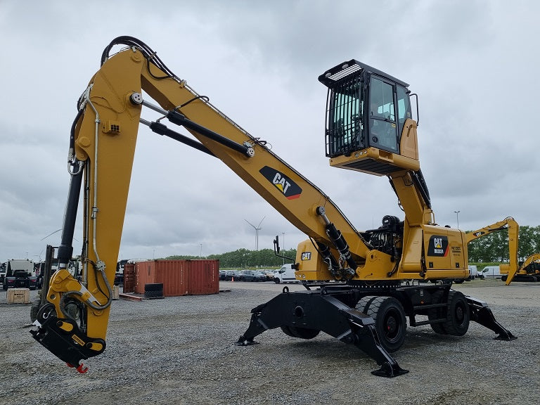 Caterpillar material handling machine with 34' 2-piece boom and stick with bucket linkage