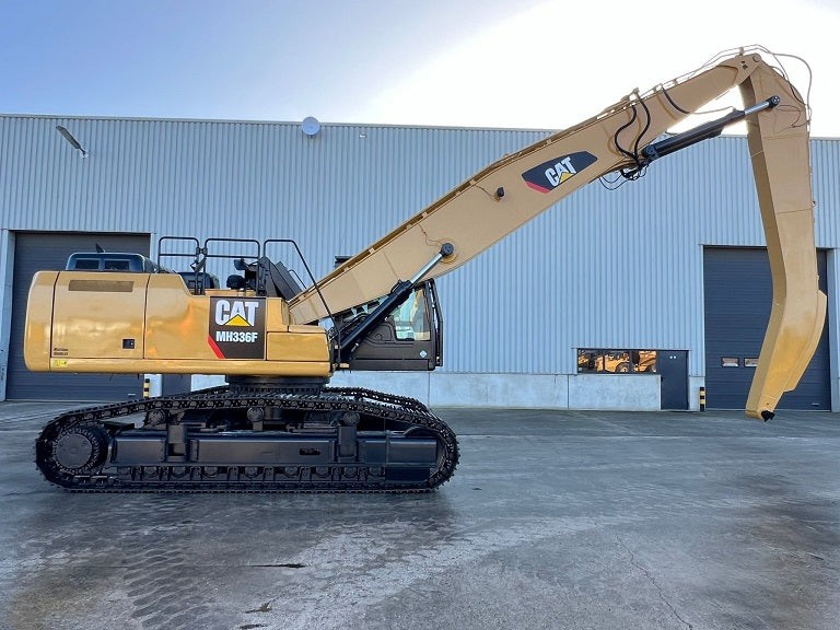 Caterpillar material handler on tracks with 52 foot boom and stick. Model MH 336F