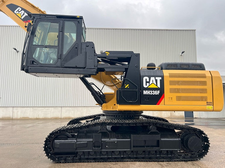 Caterpillar MH336F Material Handler on tracks with a hydraulic elevating cab