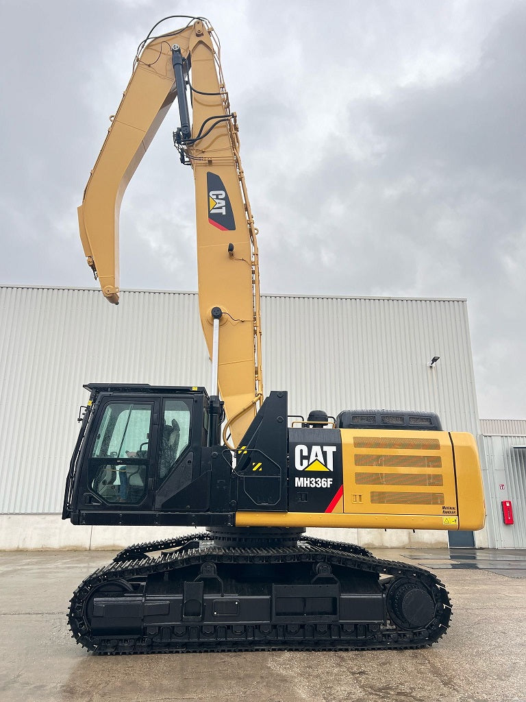 Caterpillar MH 336F Material Handler with boom and stick, on tracks, refurbished, cleaned and painted