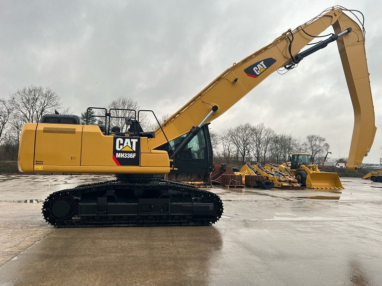 Used refurbished Caterpillar Material Handler Model MH 336F on tracks with boom and stick