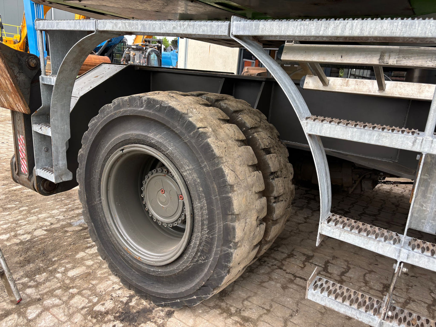 close-up of used solid tires on a material handler