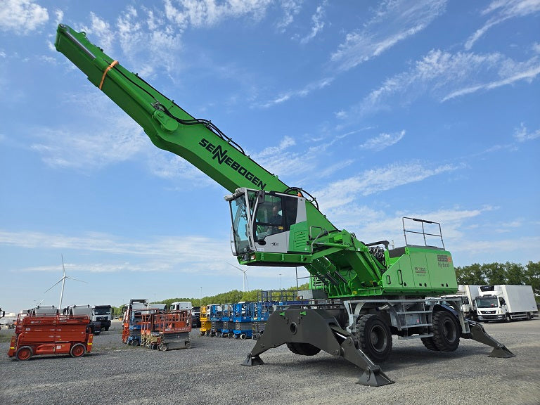 Sennebogen material handling machine with 65' reach, on sold tires