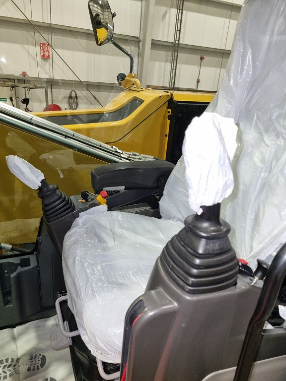 Refurbished and cleaned inside cab view of caterpillar material handler 
