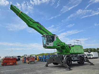 Sennebogen material handling machine with 65' reach, on sold tires 