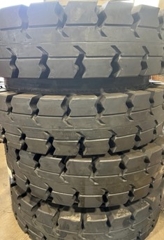 Magna M608 Twin-Mounted 12.00x24 Solid Tires on Rim main image